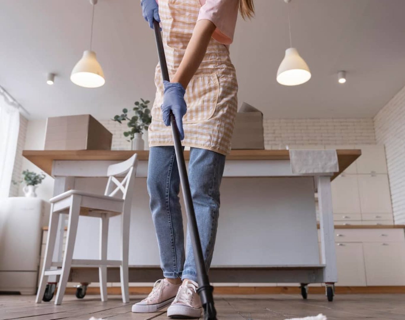 professional cleaner performing house cleaning services in Hillsborough NC